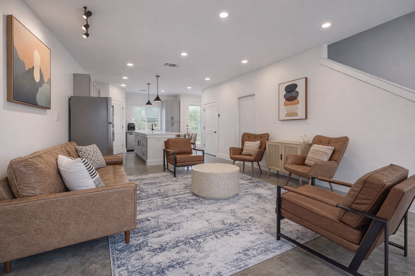 Open-concept living room in a Mosaic Suites Bishop Arts townhome