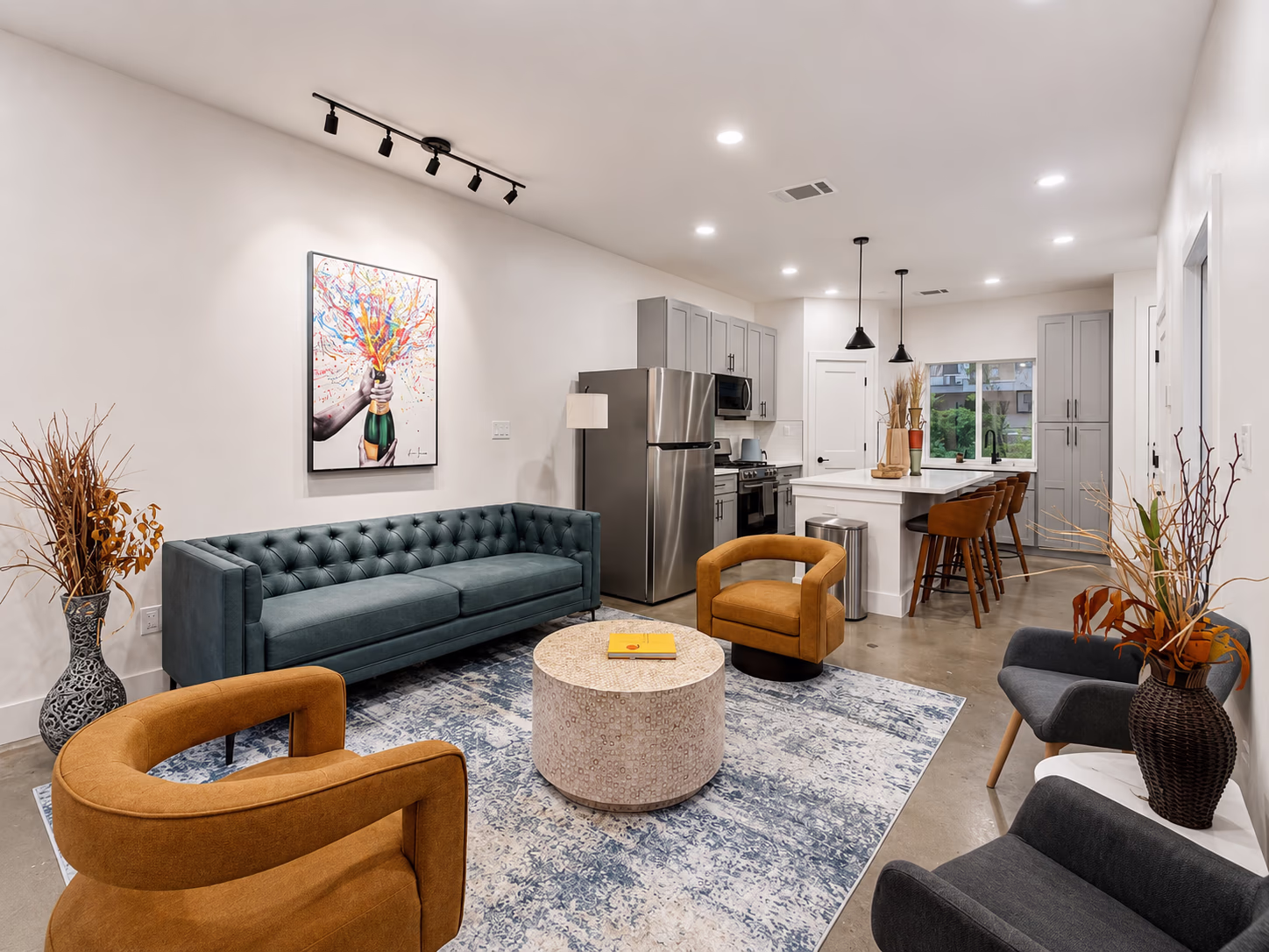 Open-concept living and dining area in a Bishop Arts townhome