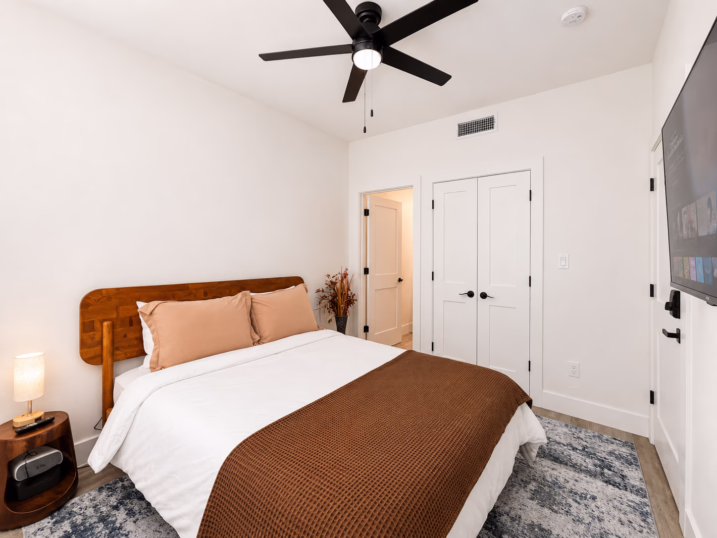 Bedroom suite with a queen bed