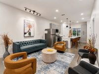 Bright living area with designer furnishings